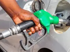 South African petrol station with rising fuel prices displayed on board