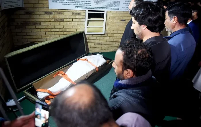 Community gathers to mourn father killed in road rage shooting as suspect claims self-defence