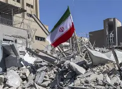 Smoke rises after U.S. airstrikes on Iranian targets as tensions escalate in the Strait of Hormuz.
