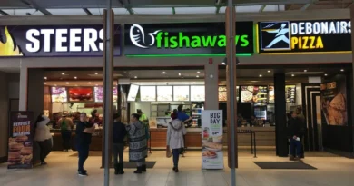 Famous Brands restaurant signage as company warns of lower interim earnings