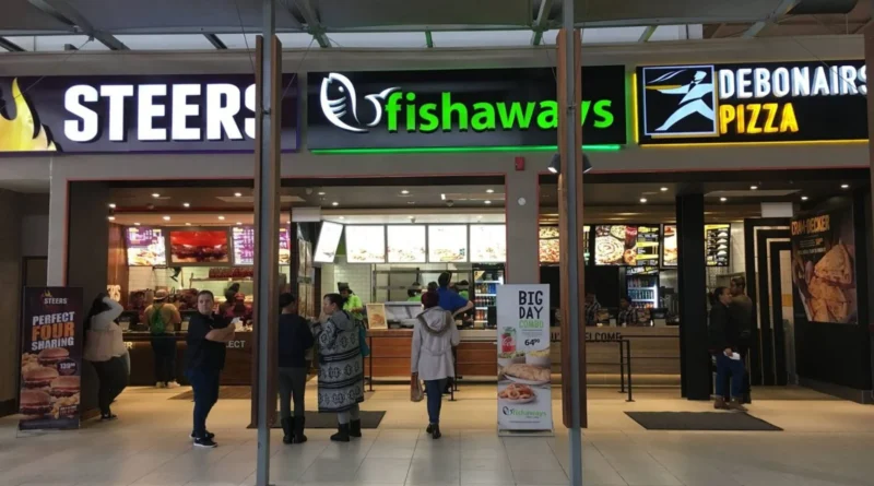 Famous Brands restaurant signage as company warns of lower interim earnings